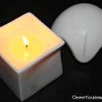 knead me massage oil candle and stone