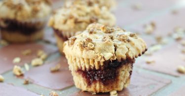 Peanut Butter and Jelly Muffins, made with Jif Cinnamon Peanut Butter!