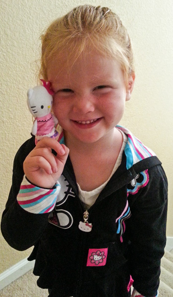 hello kitty clothes and finger puppet